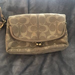 Coach gold monogram wristlet/clutch